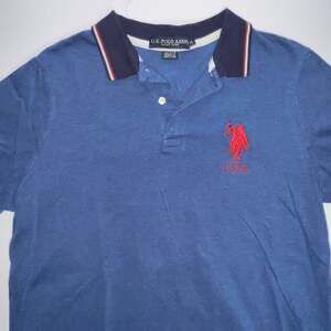 U.S. Polo Assn. Men’s Piqué Polo Shirt Embroidered Horseman Logo Red Color Tip C